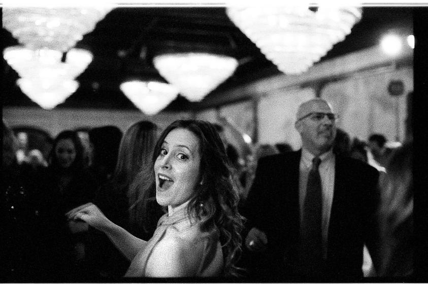 dance smile laugh film grain black and white film photography wedding reception dance maryland
