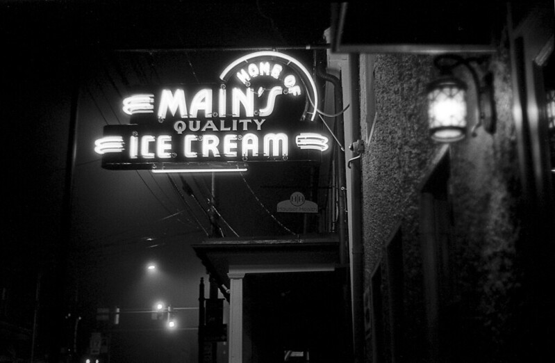Main Cup restaurant Main's Ice Cream Quality Home of Middletown Maryland Main Street West Main Street small down neon sign night leica 35mm film black and white johnny martyr photograph classic timeless 1940's 1950's 40s 50s 30s 1930's sign lit light glow