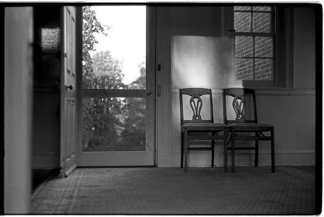 two chairs sunset rectangles composition lines black and white antique alone solitude empty emptiness old wisdom quiet peace tranquility johnny martyr frederick photographer photography maryland film 35mm 