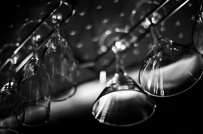 martini glasses bokeh black and white film photography pentax 50mm 1.2