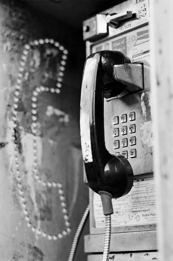 Beat Up Weathered Payphone in b&w black and white film photography Johnny Martyr