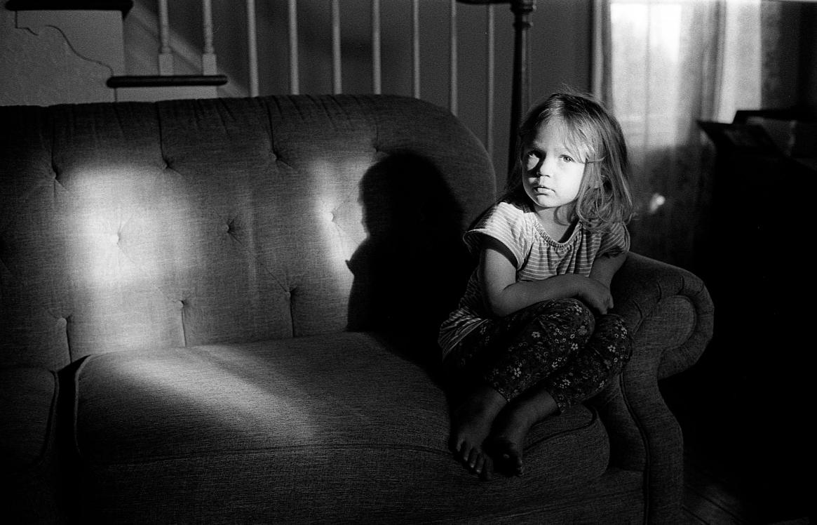 kid morning light lighting black and white child portrait candid quiet dark shadows noir mood thoughtful johnny martyr film photographer b&w