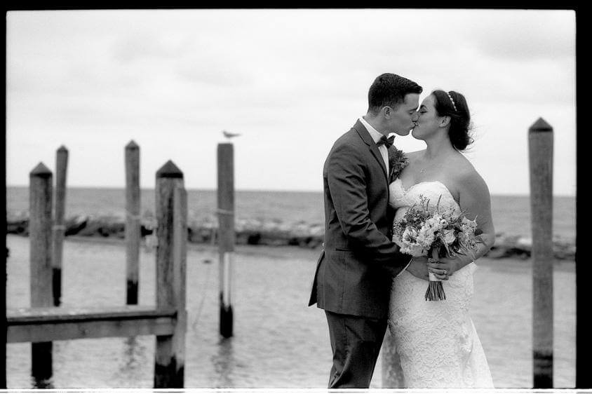  Black and White Film  black and white film photography wedding marriage bride groom dock pier water waterfront seagull dress love kiss flowers scenic
