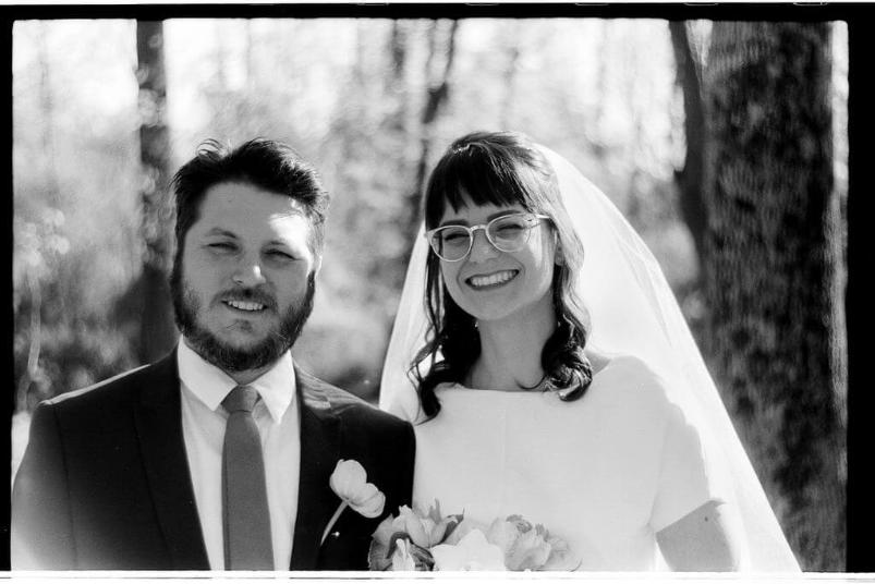 Johnny Martyr Frederick kayleigh montgomery maryland ryan glasses eyeglasses stylish hip hipster bokeh leica summitar black and white wedding film 35mm smiles smile portrait photographer artist johnny martyr happy tree light forest woods flowers